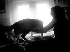 girl in the bedroom with dog